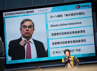 Carlos Ghosn on a TV screen