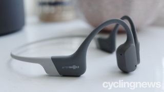 Close-up of Aftershokz Aeropex headphones sitting on a table