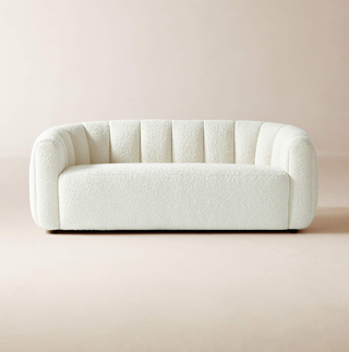 Vintage inspired white boucle sofa.