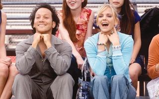 Rob Schneider and Anna Farris at a sports game in The Hot Chick.