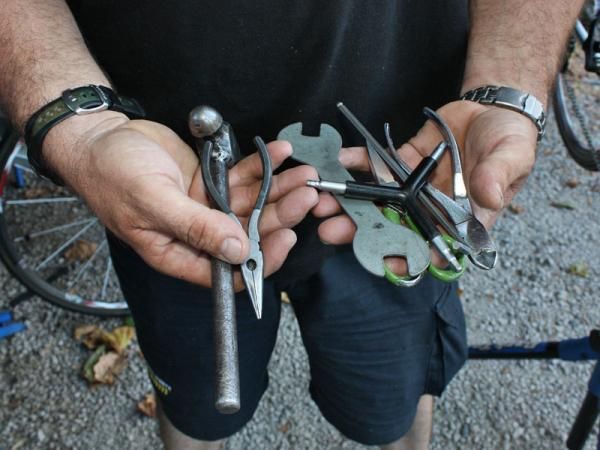 The hands of one of the best bicycle mechanics in the world, Faustino Munoz, and some of his favorite tools that have accompanied him through the years.