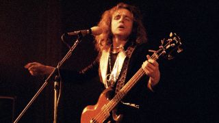 Jack Bruce of West, Bruce & Laing performs on stage in 1973 in Copenhagen, Denmark. He plays a Gibson EB-3 bass guitar. (Photo by Jorgen Angel/Redferns)