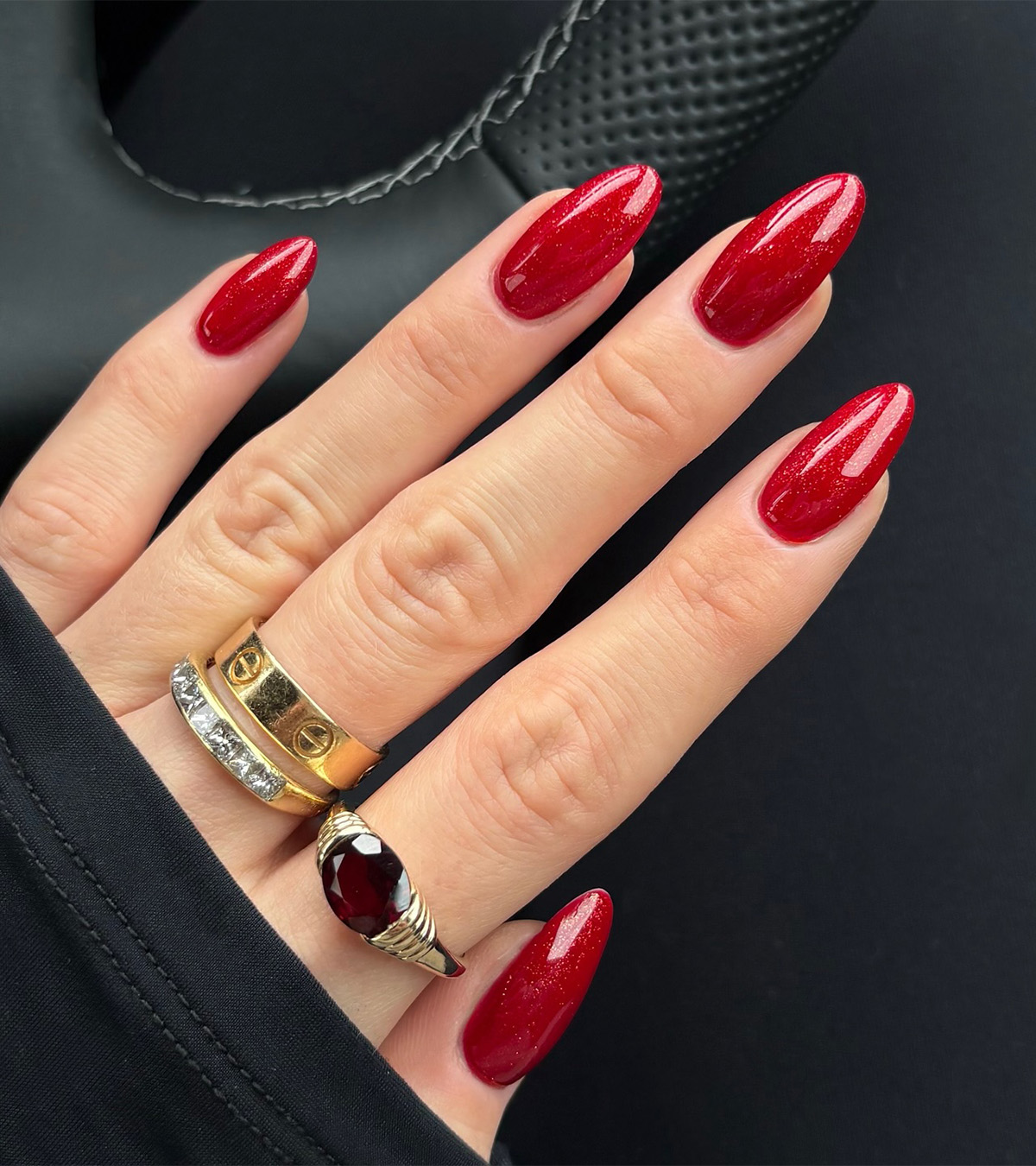 A cherry red manicure by Jessica White.