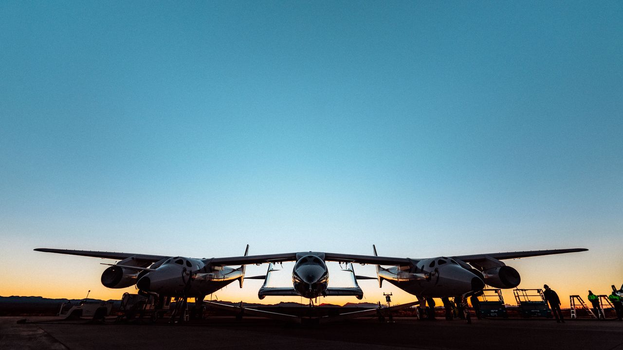 Virgin Galactic's SpaceShipTwo Unity and its mothership WhiteKnightTwo prepare for the first test launch attempt from Spaceport America, New Mexico at dawn on Dec. 12, 2020.