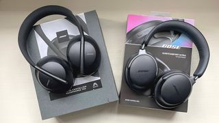 Bose QC Ultra Headphones vs. Bose 700 showing review models and packaging