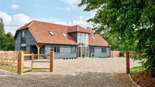 barn style self build with glazed openings