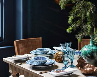 Blue Christmas table decorating scheme in a blue dining room