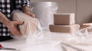 Bubble wrap being used to package items