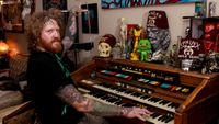 Brent Hinds of Mastodon at home with electric organ, Atlanta, Georgia, United States, 13th August 2011. 