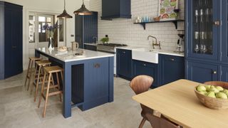 blue bespoke kitchen with island