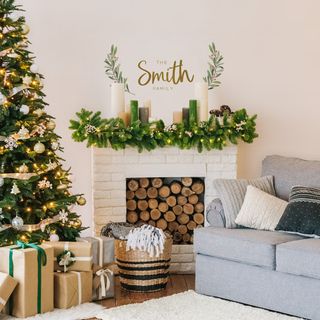 custom decals decorating wall above festive fireplace for christmas