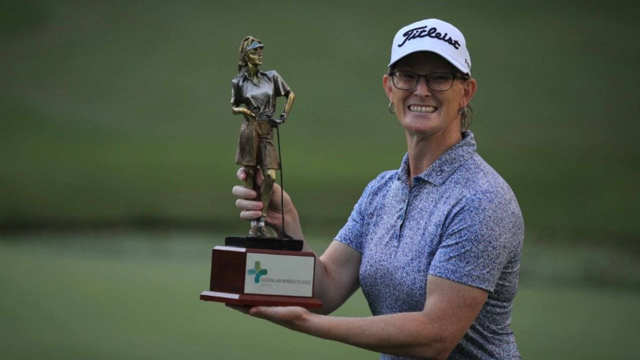 Breanna Gill holding her trophy