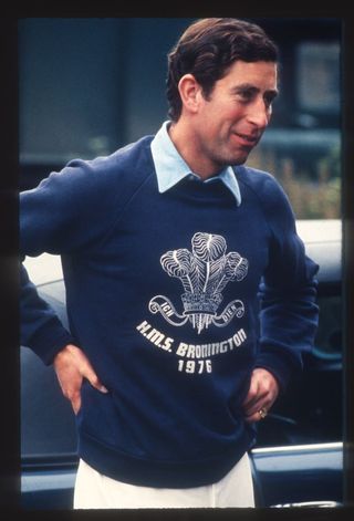 King Charles rocks a statement logo sweater back in the 1970s