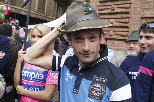 Michele Scarponi was styling in a traditional alpine hat