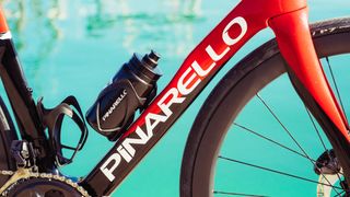 A red and black pinarello F road bike