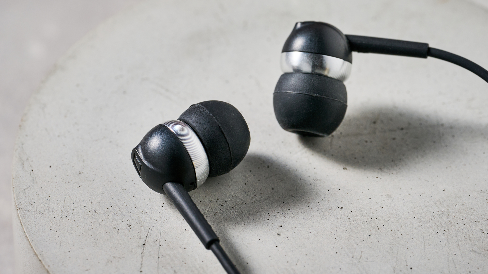 Sennheiser CX 80U earbuds on block