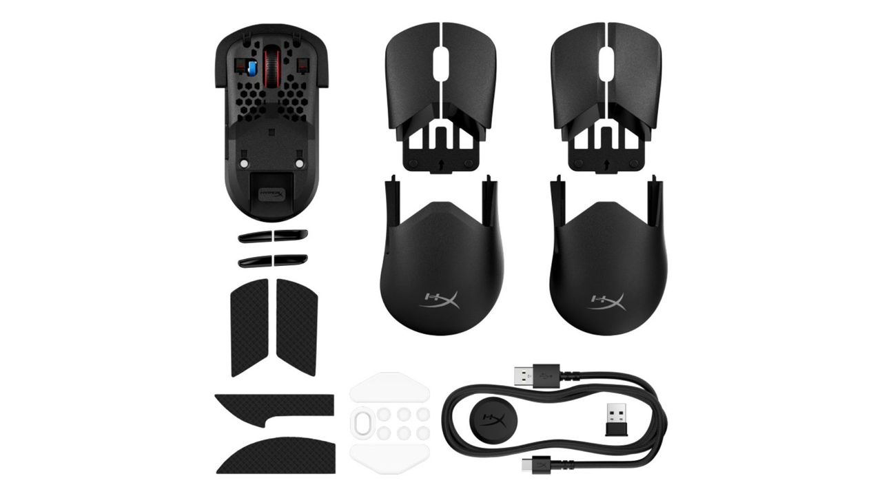 A disassembled HyperX Pulsefire Saga gaming mouse with parts spread out in front of a white background