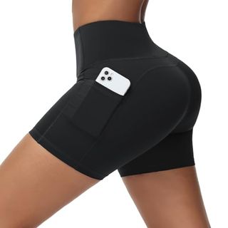 Baleaf biker shorts being worn by a woman with a phone in her pocket