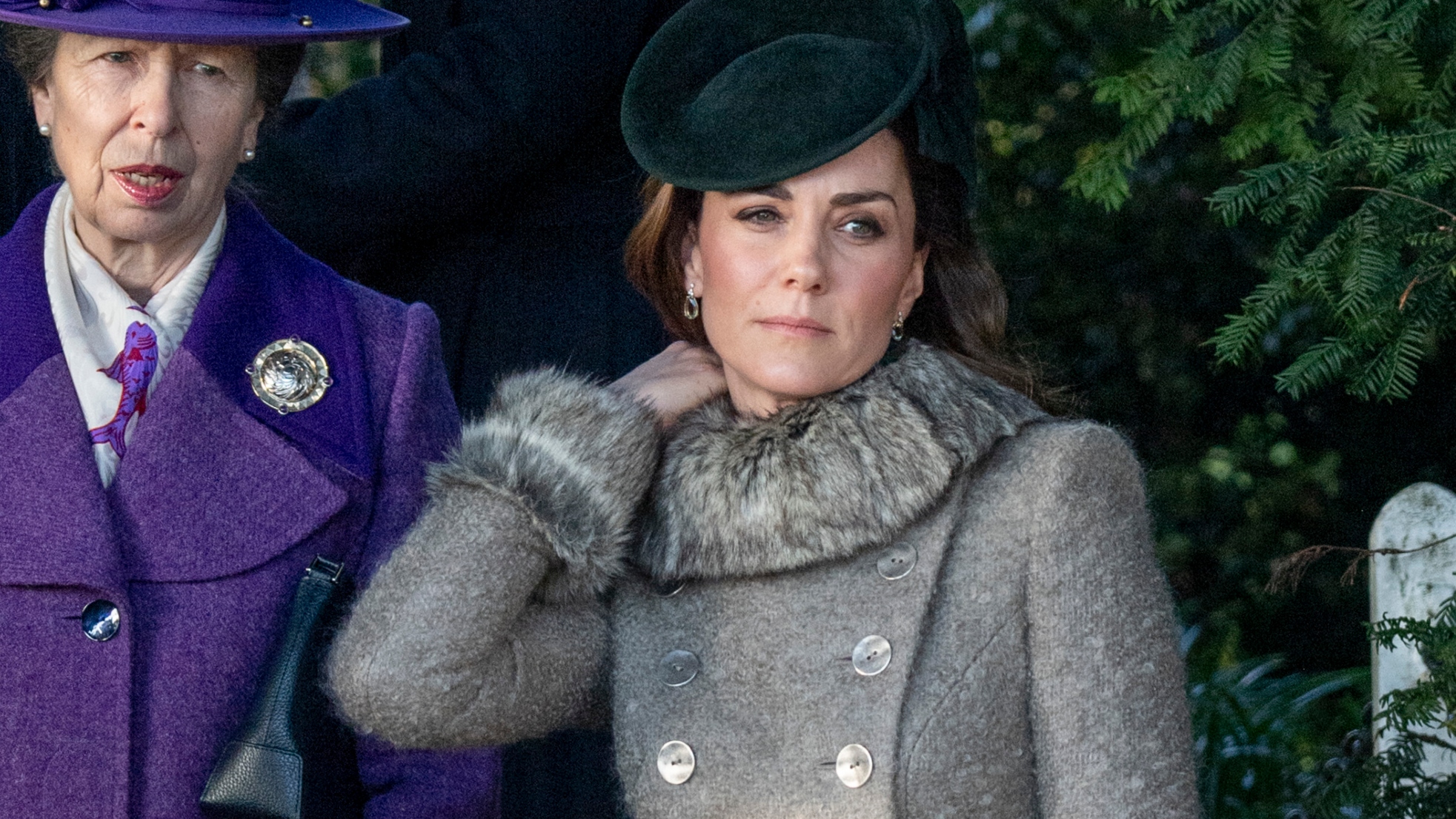 Catherine, Princess of Wales adjusts her coat collar as she attends the Christmas Day Church service 2019