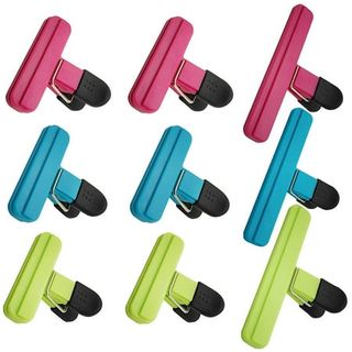 Three rows of three food bag clips. The top row is pink, the middle is blue, and the last row is green