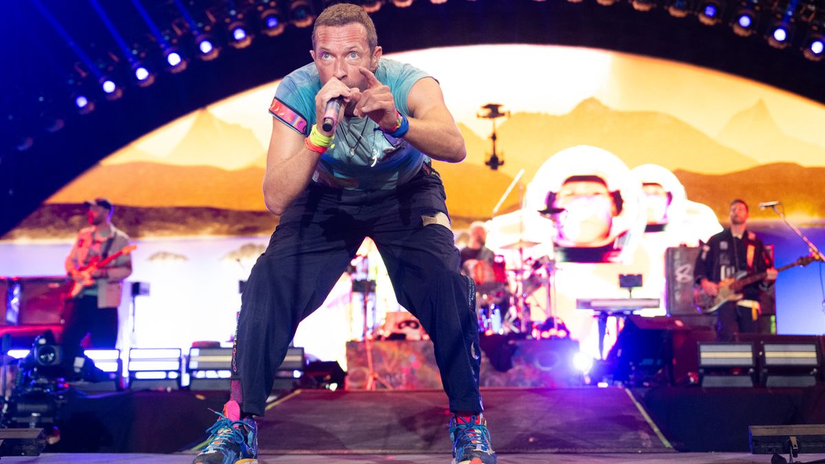 Chris Martin and Coldplay on stage at Glastonbury 2024