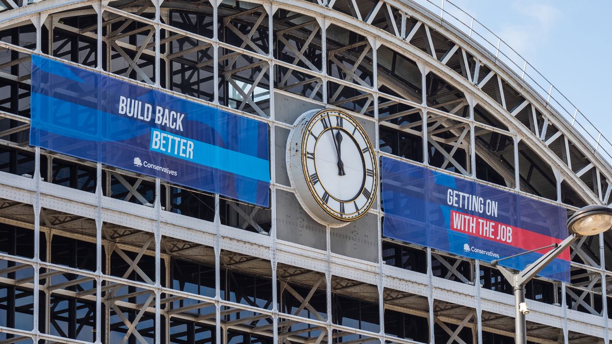 Conservative party conference banner displayed on a building in Manchester