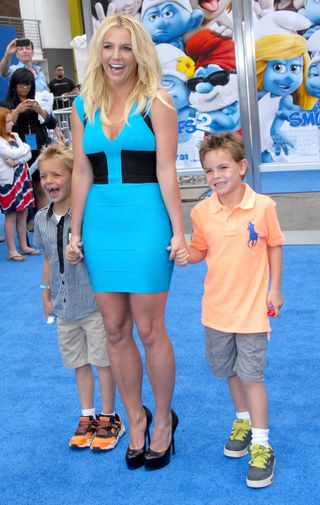 Singer Britney Spears (C) and sons Sean Preston Federline (L) and Jayden James Federline (R) arrive at the Los Angeles Premiere 'Smurfs 2'