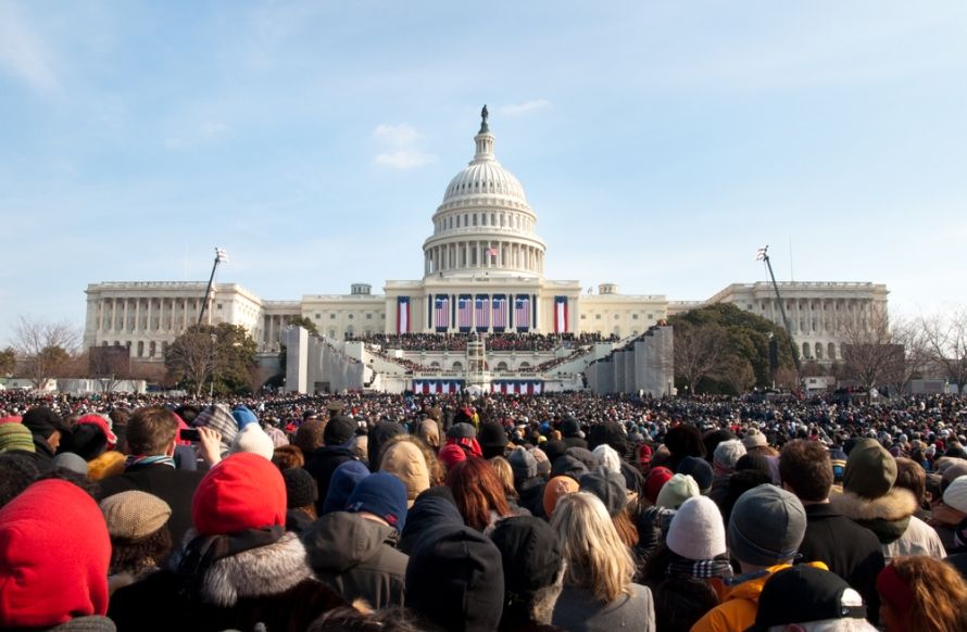  A crowd of warmly dressed onlookers attends the 2009 inauguration of President Barack Obama.