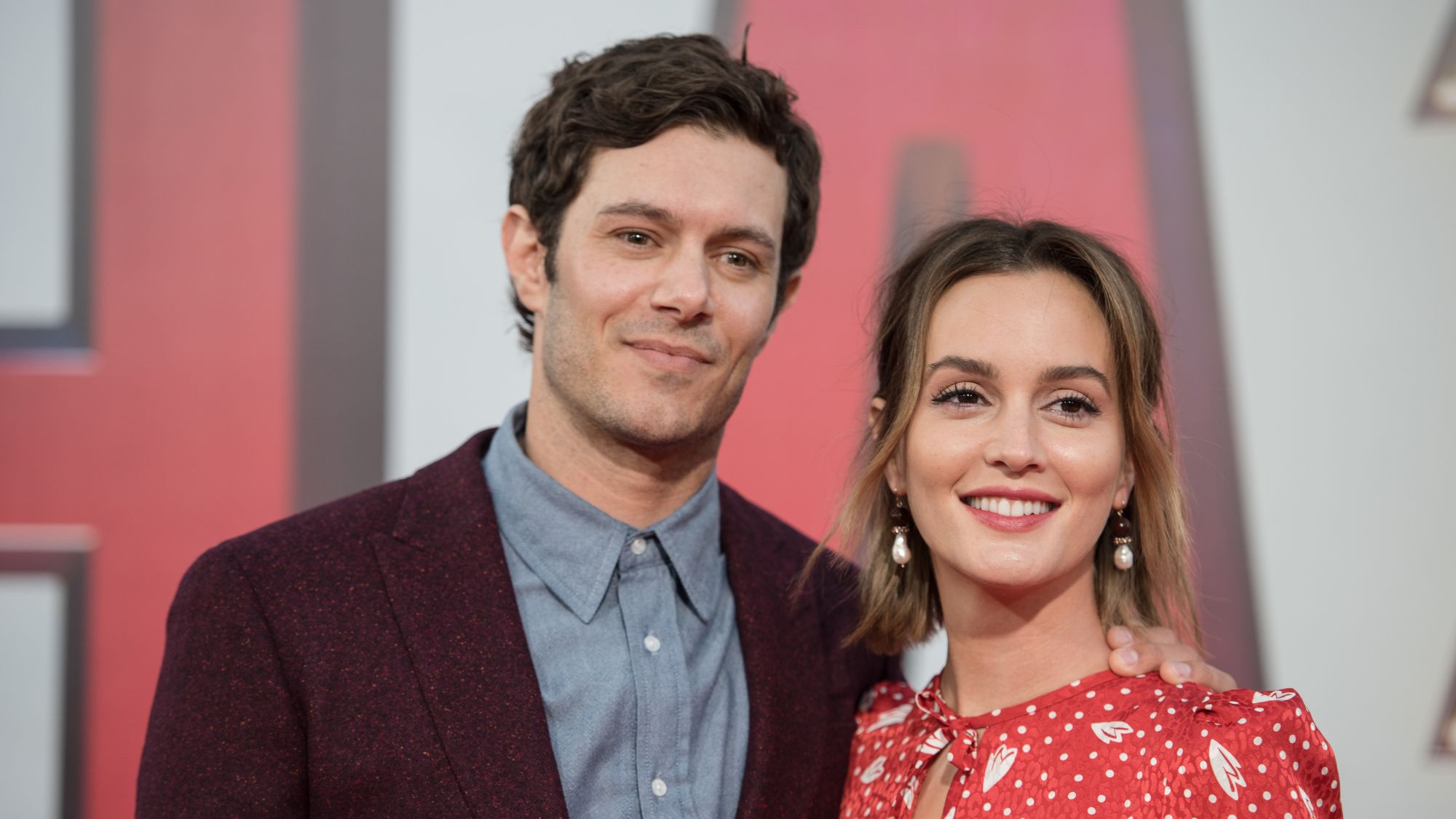 Adam Brody and Leighton Meester attend the world premiere of SHAZAM!