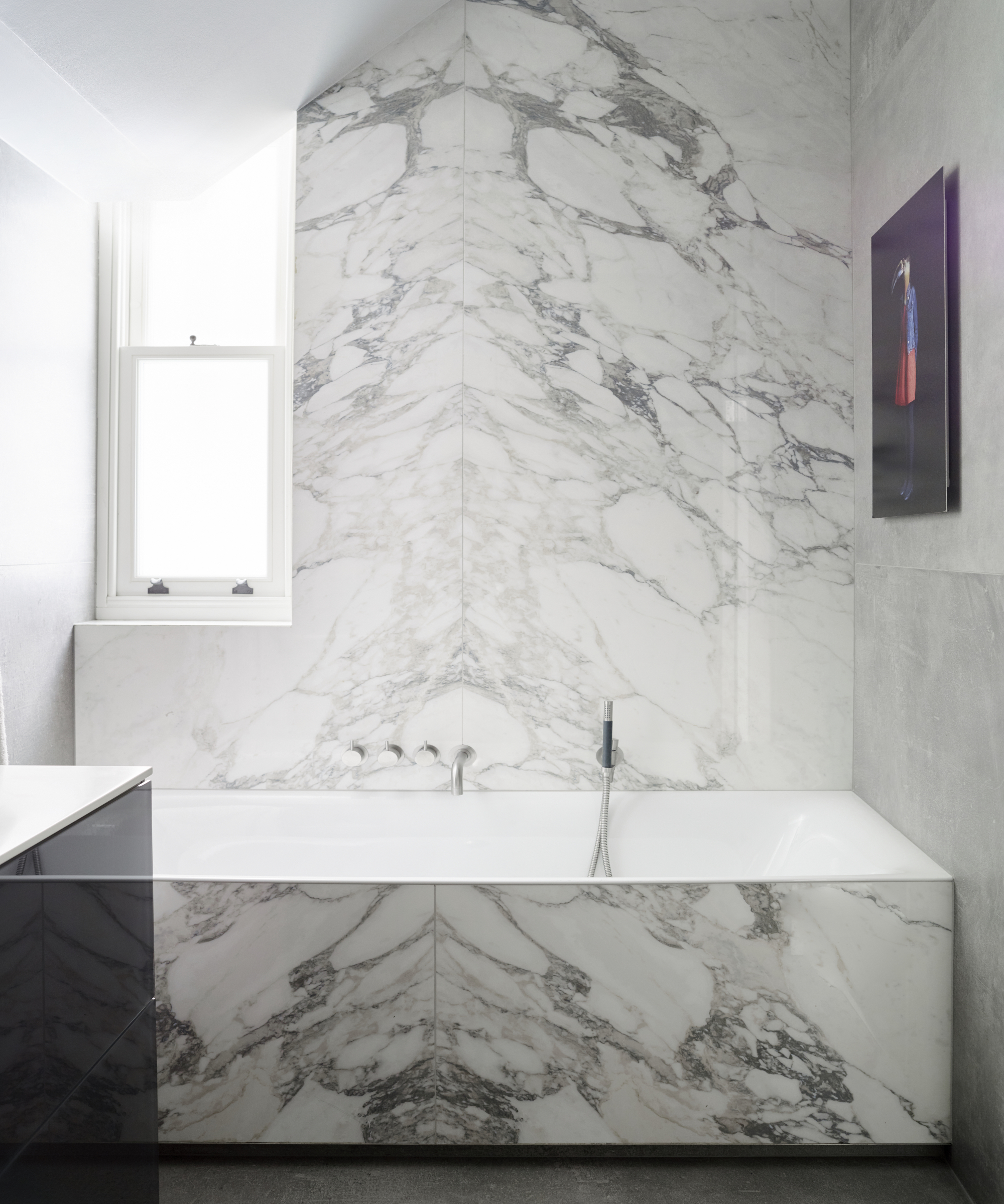 Modern house in a neutral, monochrome palette with pastel pink touches