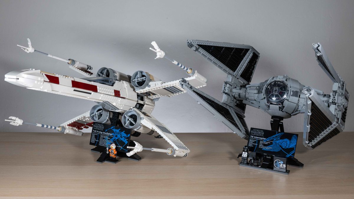UCS Lego TIE Interceptor (right) next to last year's UCS Lego X-Wing (left) on a neutral background