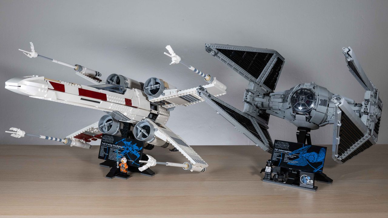 UCS Lego TIE Interceptor (right) next to last year's UCS Lego X-Wing (left) on a neutral background