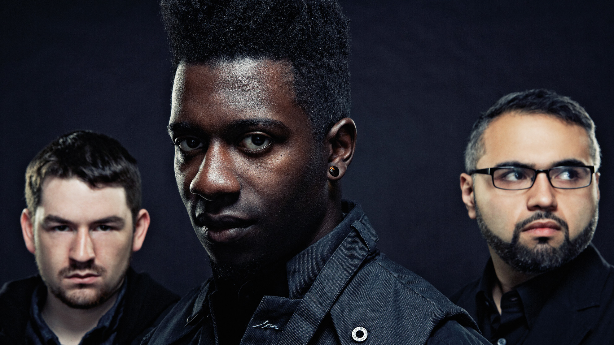 Animals As Leaders portrait against a black background