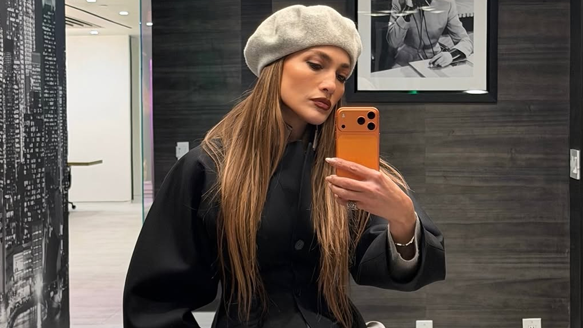 jennifer lopez returned to her L.A. office in a gray beret and matching pleated pants