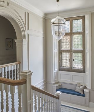 New Forest Manor with built-in bench style seating on staircase landing