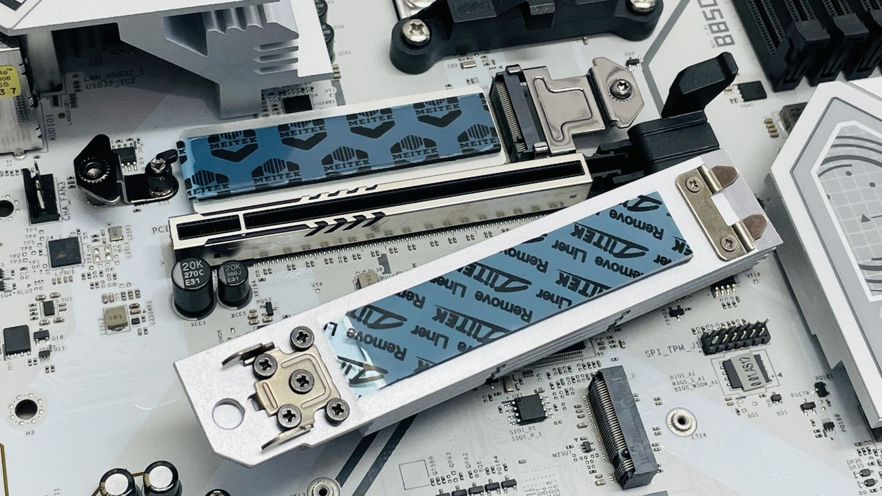 ASRock B850 Steel Legend Wi-Fi motherboard on a desk.