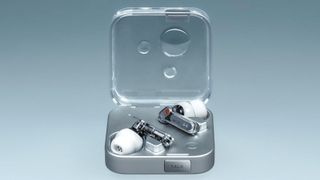 Nothing Ear 3 earbuds in metal charging case