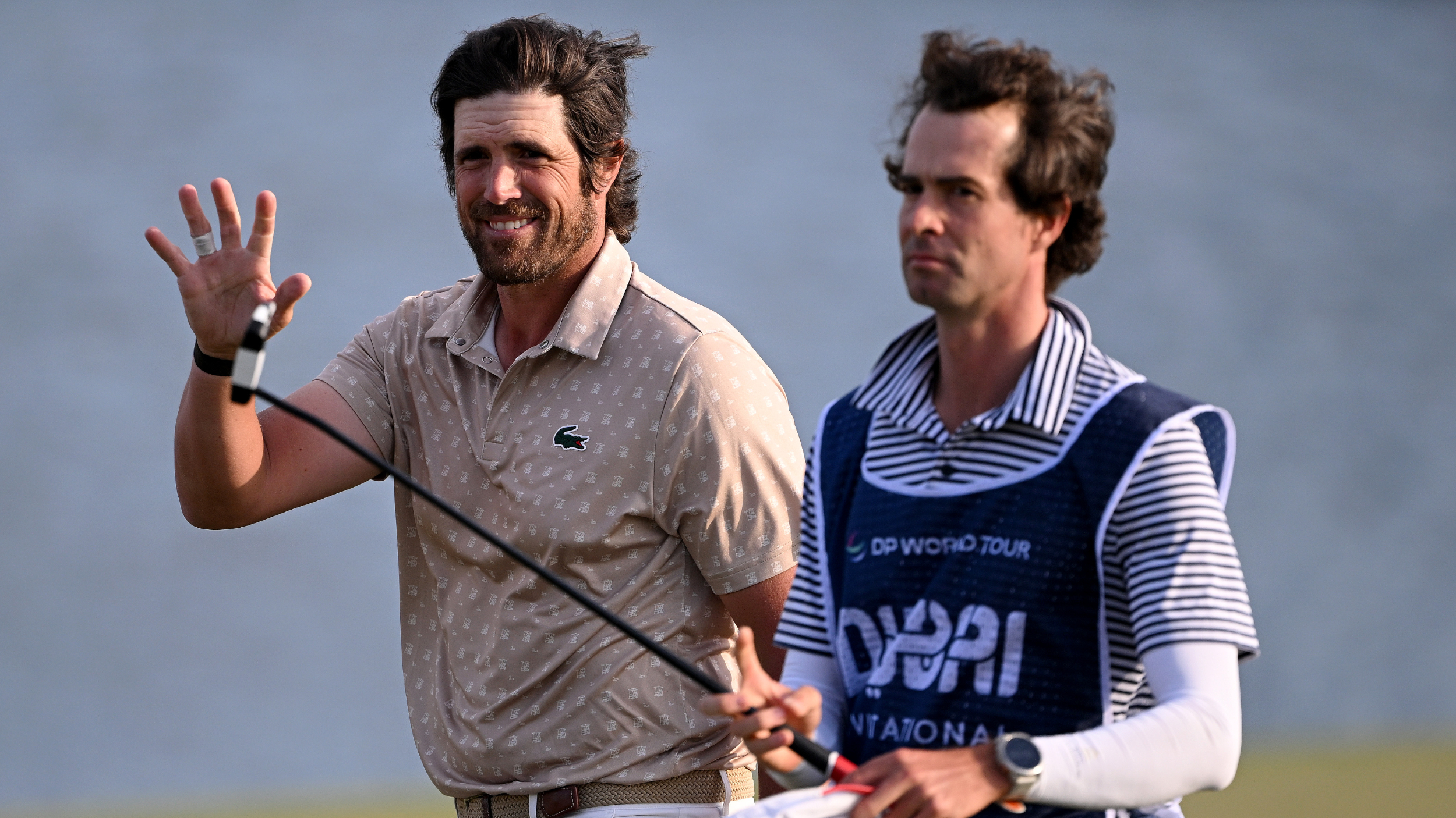 Nacho Elvira and his caddie at the Dubai Invitational