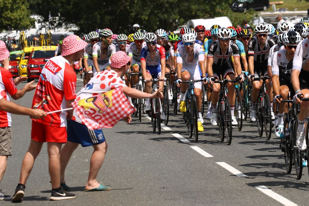 Fans cheer on the peloton on stage 17 of the Tour de France