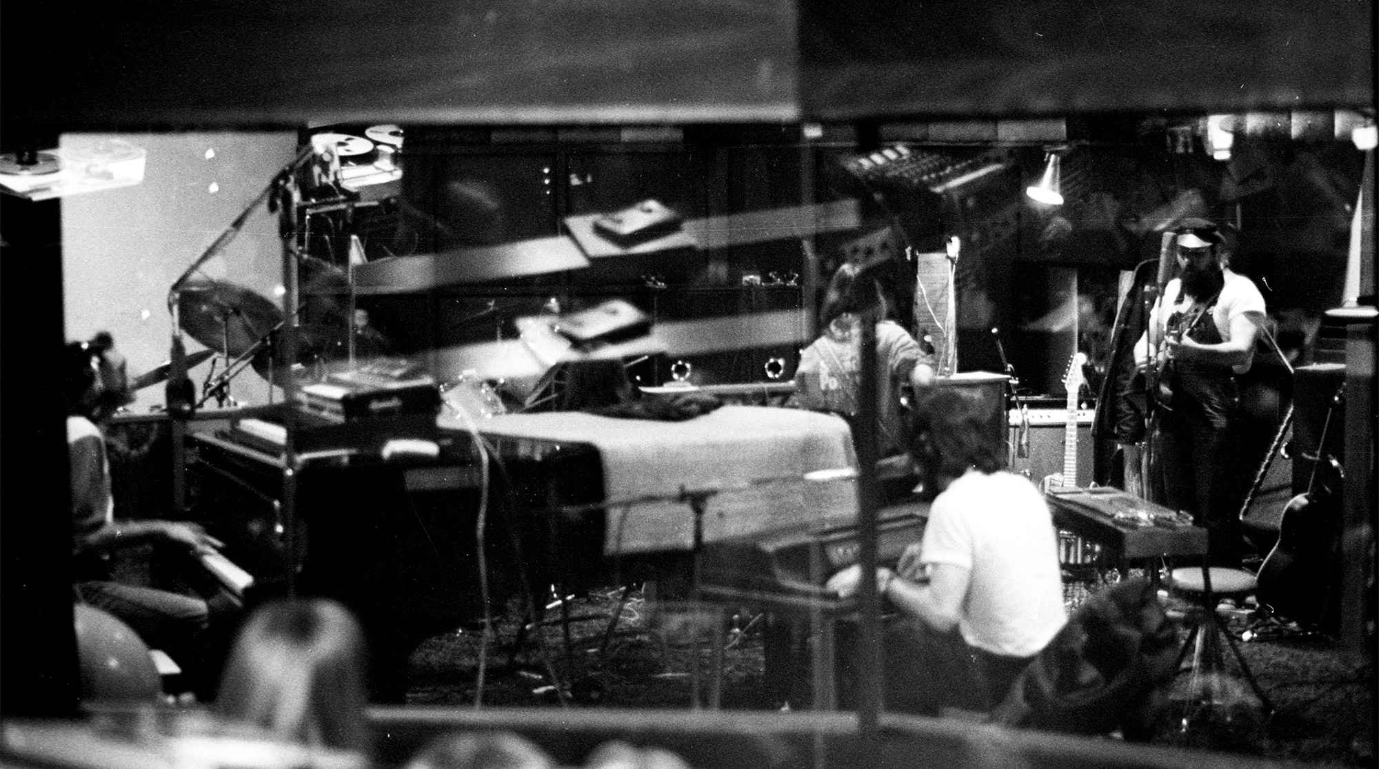 Donald Fagen, Walter Becker, Denny Dias of the rock group "Steely Dan" record a session with Michael McDonald in the studio in circa 1975.