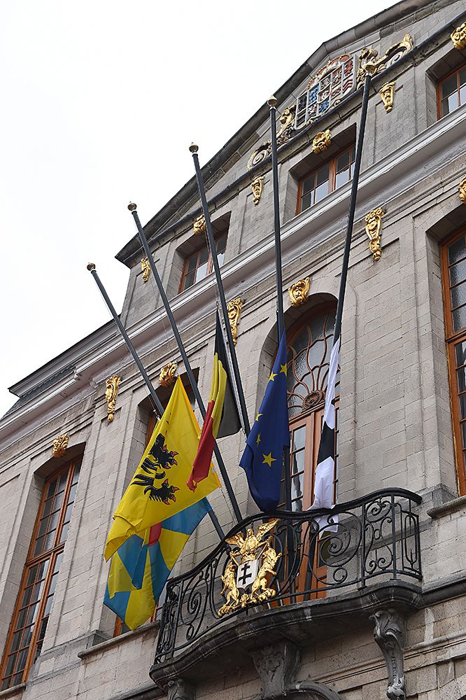 Roeselare City, flags are at half mass in mourning for the bombings in Brussels the day before
