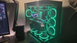 A gaming PC with RGB lighting enabled on a desk.