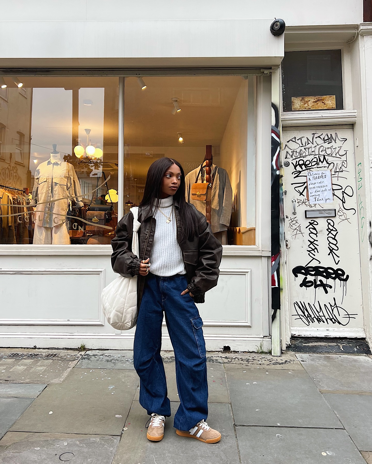 Influencer wears Gola trainers.