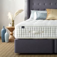 A Harrison Spinks mattress on a divan bed