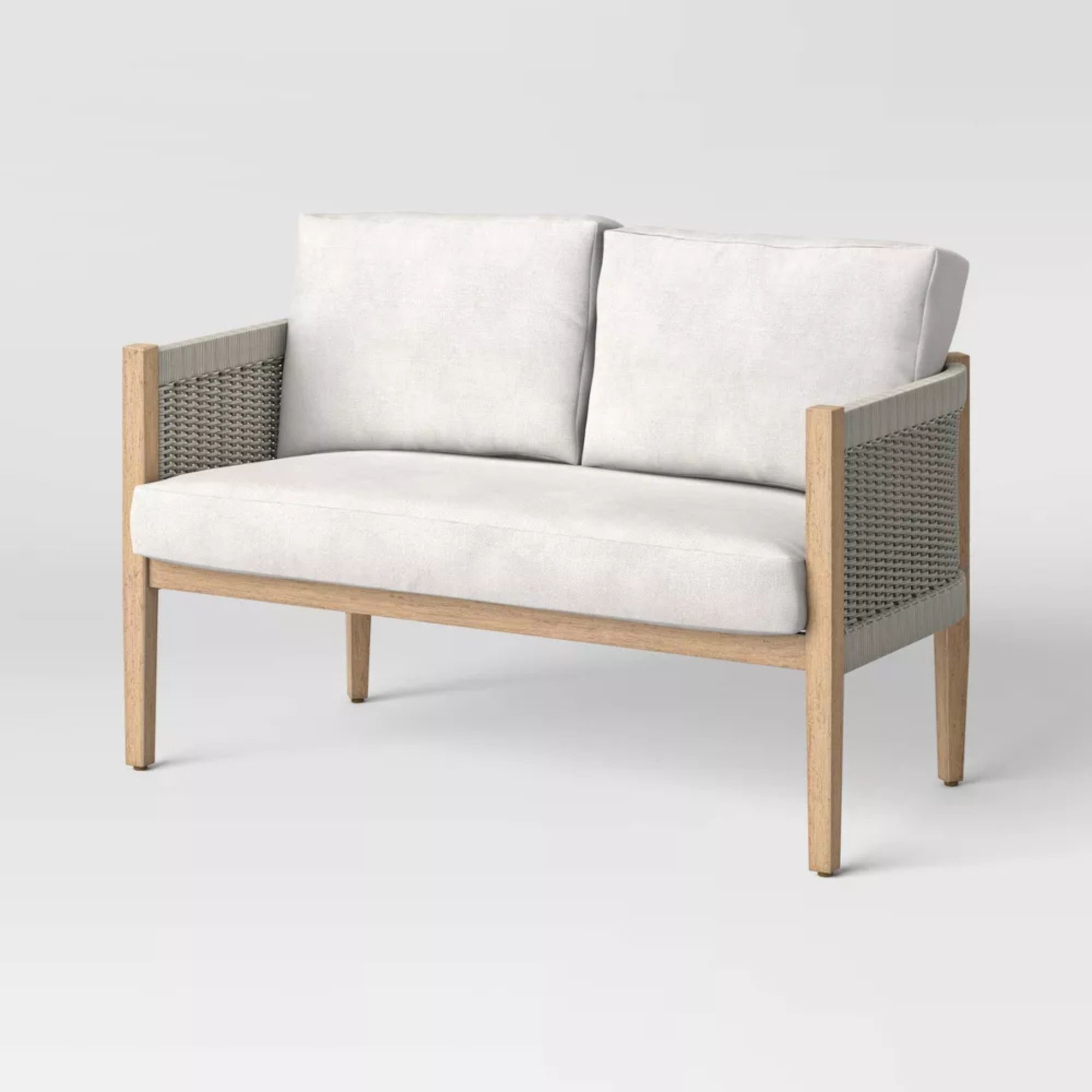 Outdoor love seat with wooden frame and gray woven sides and cushions