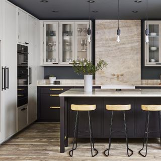 Davonport kitchen with black island and base units and white wall units