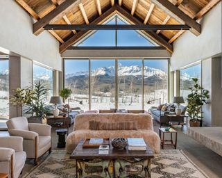 hilary swank's living room with a large uncovered window