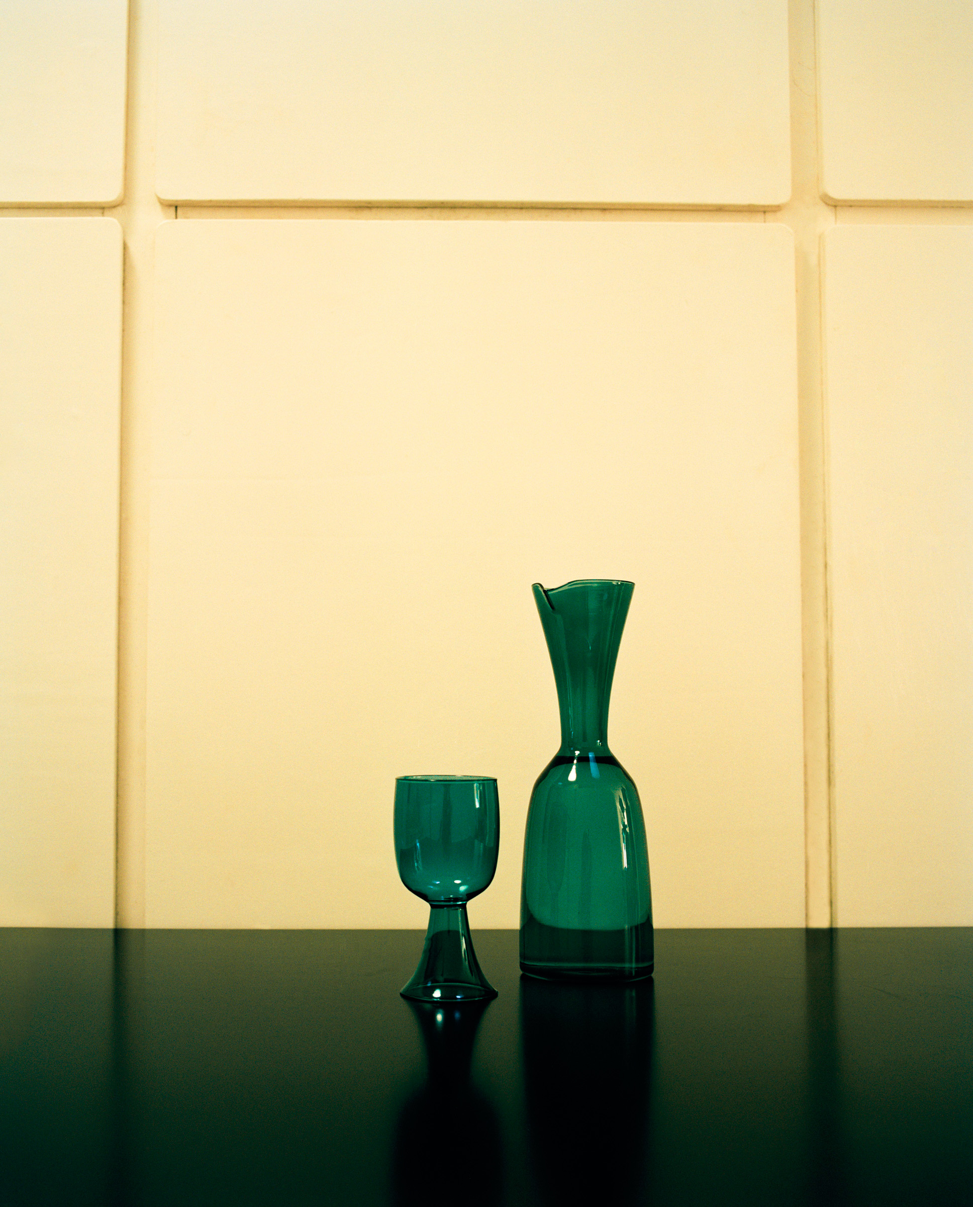 green glass carafe and glass set