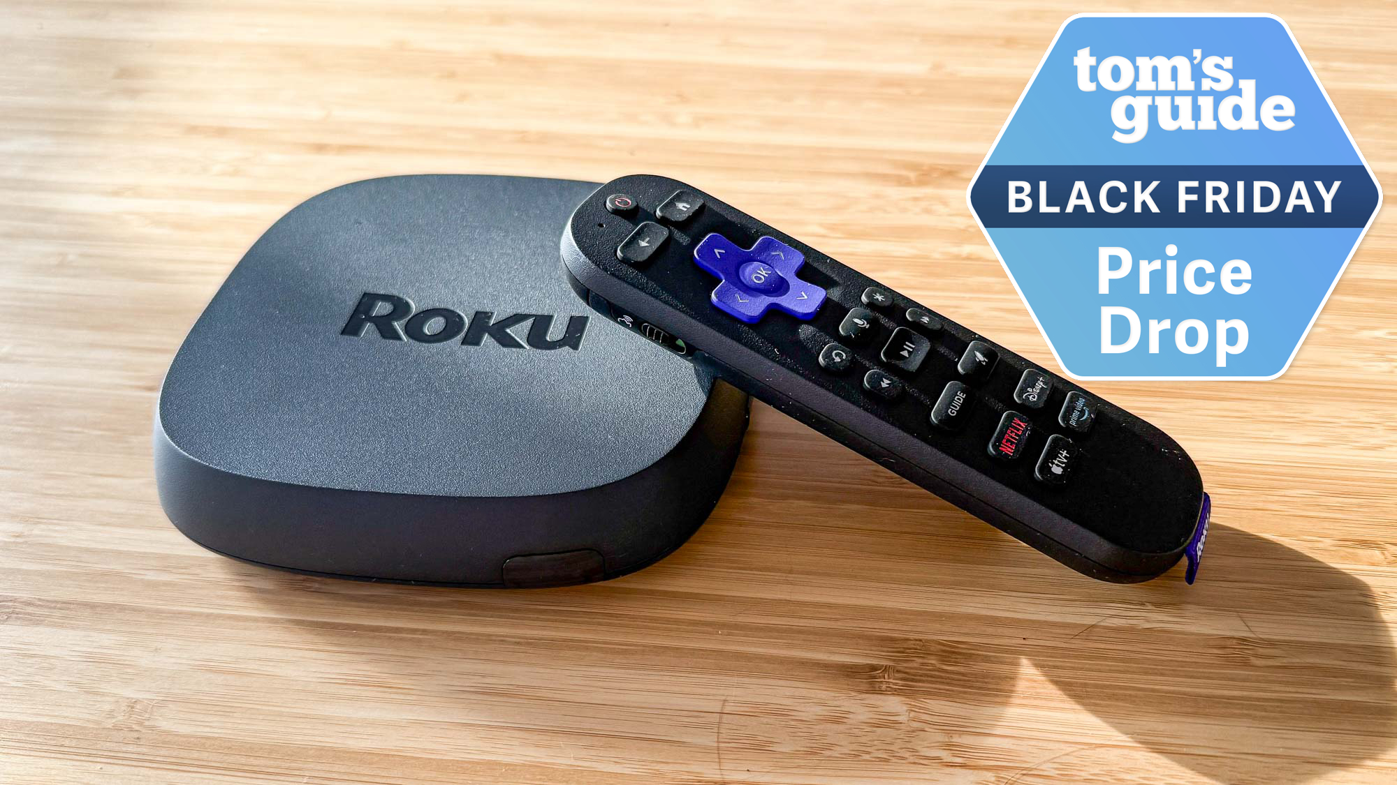 A Roku Ultra on a table with a Tom's Guide Black Friday deals badge