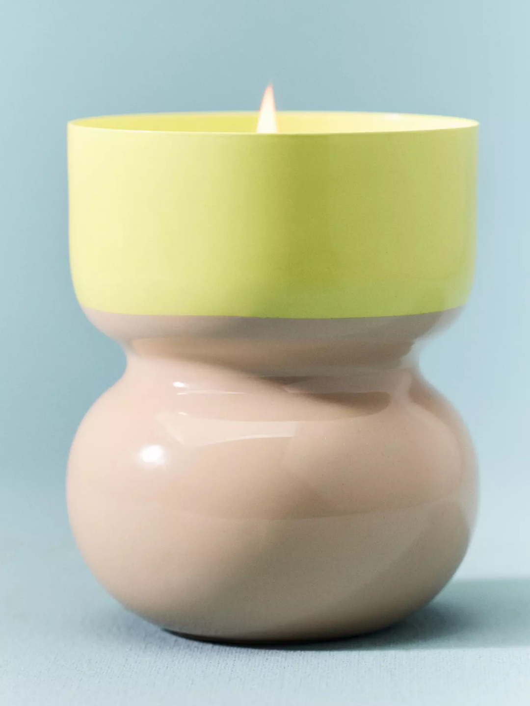 An Anthropologie scented candle with bergamot and green tea